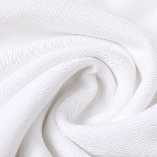 Good Luck TinTin fabric
white textured fabric
knitted garment fabric
T-shirt fabric wholesale
breathable apparel fabric
bulk fabric supplierClose-up of white Good Luck TinTin fabric with a fine textured knit pattern arranged in soft folds.