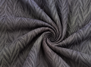 Grey Khajuri fabric texture showing premium polyester knit surface for garment manufacturing