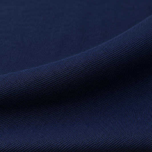 US Mars Polo fabric
navy blue polo T-shirt fabric
polyester polo fabric
breathable sportswear fabric
wholesale T-shirt fabric
bulk apparel fabric supplier
Close-up of navy blue US Mars Polo fabric with a smooth knitted texture and soft folded drape.