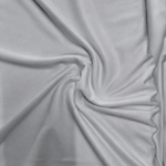 PP110 polyester fabric
white sportswear fabric
lightweight polyester fabric
moisture-wicking fabric
wholesale activewear fabric
bulk T-shirt fabric supplier
Close-up of white PP110 polyester fabric arranged in soft folds, showing its smooth lightweight texture for sportswear and activewear.